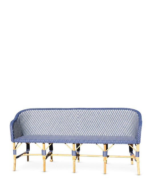 Banquette Eugénie en rotin tissé main — Maison Louis Drucker au salon Decorex 2026